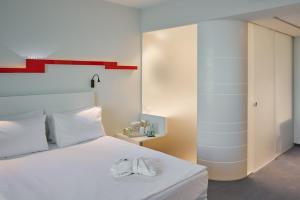 Cama ou camas em um quarto em Holiday Inn Vilnius by IHG
