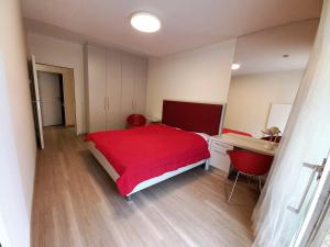 Säng eller sängar i ett rum på LB2 Seeappartement Haus Landskron direkt am Ossiachersee