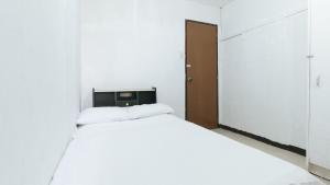 Posteľ alebo postele v izbe v ubytovaní Ocean Villa