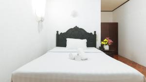Postel nebo postele na pokoji v ubytování Ocean Villa