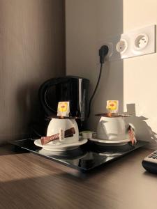 two hello kitty toasters sitting on a tray at Mariana Plage in La Marana