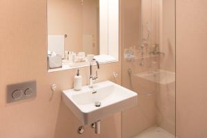 Ένα μπάνιο στο Boutique & Art Hotel Helvetia