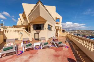 Balkon lub taras w obiekcie MEDANO4YOU Carmen's Beach House
