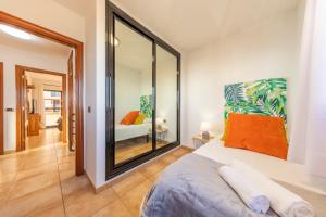 Łóżko lub łóżka w pokoju w obiekcie MEDANO4YOU Carmen's Beach House