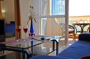 A seating area at Ferienwohnung PLAYA - Pool - 50 m Strand - Meerblick - WiFi