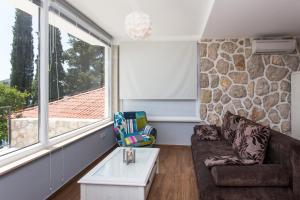 Posedenie v ubytovaní Apartments Villa Mirjana