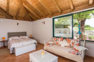 Posteľ alebo postele v izbe v ubytovaní Apartments Villa Mirjana