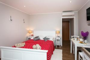 Posteľ alebo postele v izbe v ubytovaní Apartments Villa Mirjana