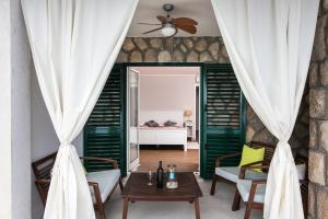 Posedenie v ubytovaní Apartments Villa Mirjana