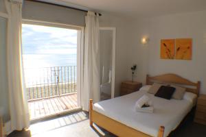 Ένα ή περισσότερα κρεβάτια σε δωμάτιο στο Agi Gaviota Villa