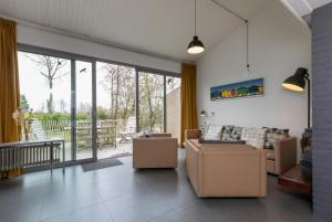 Posezení v ubytování Welcome in - Lepelblad 7, Nieuwvliet