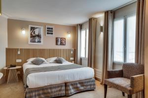 Ein Bett oder Betten in einem Zimmer der Unterkunft Passy Eiffel