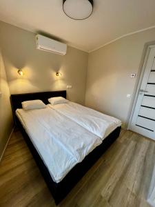 Letto o letti in una camera di Hotel Vesiroos