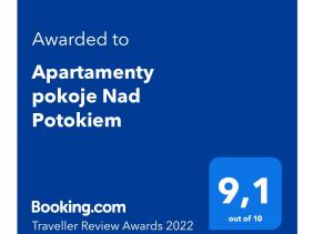 Certyfikat, podpis lub inny dokument wystawiony w obiekcie Apartamenty pokoje Nad Potokiem