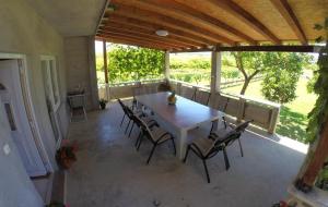 Balkón alebo terasa v ubytovaní Holiday house in Ljubač with sea view, terrace, air conditioning, Wi-Fi (4851-1)