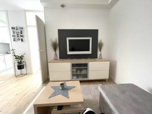 Televízia a/alebo spoločenská miestnosť v ubytovaní La bella casa, SELF CHECK-IN, FREE PARKING