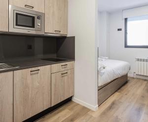 A kitchen or kitchenette at Micampus Santander Student Residence