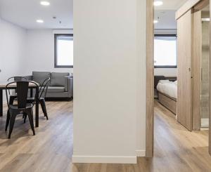 A bed or beds in a room at Micampus Santander Student Residence