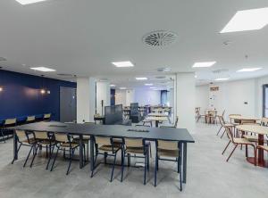 A restaurant or other place to eat at Micampus Santander Student Residence