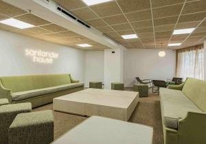 A seating area at Micampus Santander Student Residence
