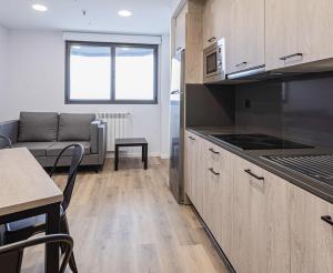 A kitchen or kitchenette at Micampus Santander Student Residence