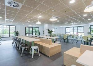 A restaurant or other place to eat at Micampus Santander Student Residence
