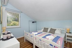 Posteľ alebo postele v izbe v ubytovaní Sea Forever Apartments