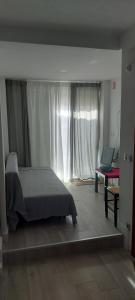 Posteľ alebo postele v izbe v ubytovaní Apartamento SUERTE con vistas a la playa San Antonio de Cullera