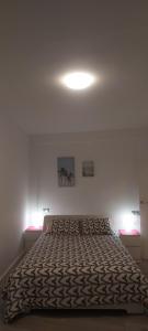 Posteľ alebo postele v izbe v ubytovaní Apartamento SUERTE con vistas a la playa San Antonio de Cullera