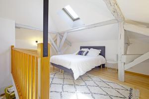 Cama o camas de una habitación en Appartement Gambetta