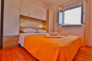 Lova arba lovos apgyvendinimo įstaigoje Apartments Lenka