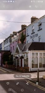 a rendering of a street with a building at The Astor in Ballybunion