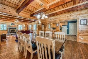 a dining room with a table and chairs at Black Diamond Lodge in Big Creek