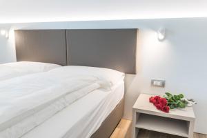 Rúm í herbergi á Albergo Garni Francesco
