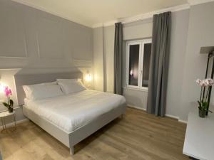 Postel nebo postele na pokoji v ubytování Residenza Montebello + 37 fotografií