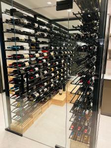 a wine cellar filled with lots of wine bottles at Hotel VIU57 in Mellieħa