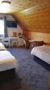 Postel nebo postele na pokoji v ubytování Carn Mhor Bed and Breakfast