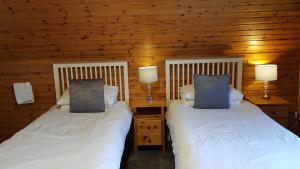 Postel nebo postele na pokoji v ubytování Carn Mhor Bed and Breakfast