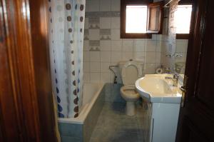 Koupelna v ubytování Mani Villas + 43 fotografií