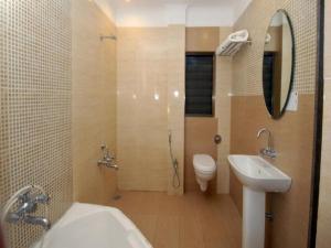 Koupelna v ubytování Sai Palace Budget Hotel