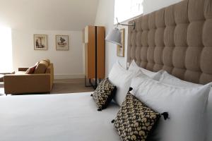 Postel nebo postele na pokoji v ubytování Hôtel Ginkgo - SPA Biloba