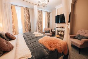TV a/nebo společenská místnost v ubytování Hotel Telč