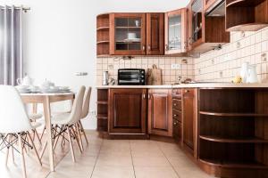 Kuchyňa alebo kuchynka v ubytovaní ZAKOHOME- Apartament Snowdancer