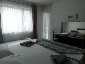 Postel nebo postele na pokoji v ubytování Apartment Krišković