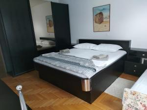 Postel nebo postele na pokoji v ubytování Apartment Krišković