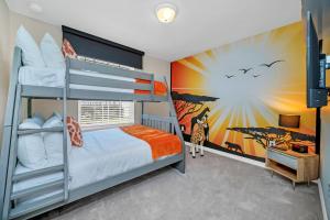 a bedroom with two bunk beds and a giraffe mural at Free Waterpark Private Splash Pool Near Disney in Davenport +58 photos