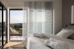 Postel nebo postele na pokoji v ubytování Luxury villa Mia