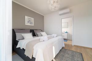 Postel nebo postele na pokoji v ubytování Luxury villa Mia