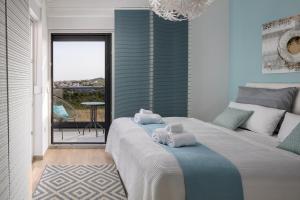 Postel nebo postele na pokoji v ubytování Luxury villa Mia