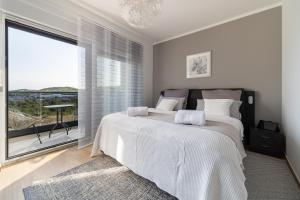 Postel nebo postele na pokoji v ubytování Luxury villa Mia